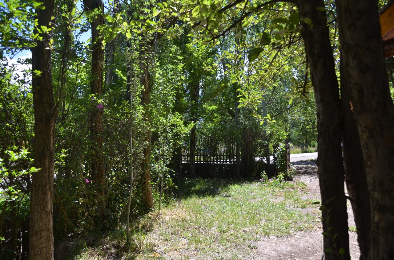 Casa de Fin de Semana en Potrerillos | Ríos Libres Dormitorio principal de cabaña en Las Carditas